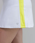 White shorts with a yellow stripe and a heart logo on a neutral background