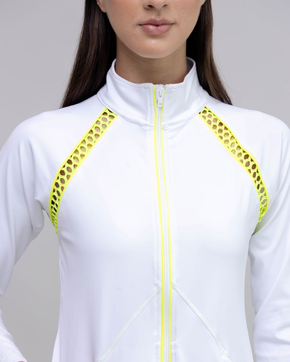 White jacket with yellow accents on a gray background